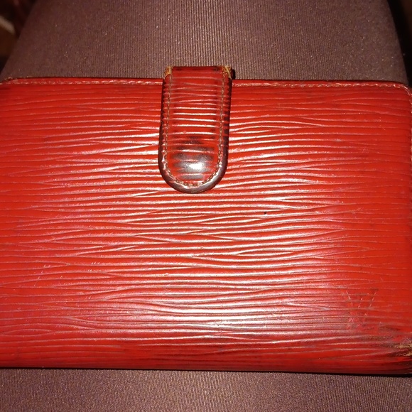 Louis Vuitton red epis wallet in used condition authentic...